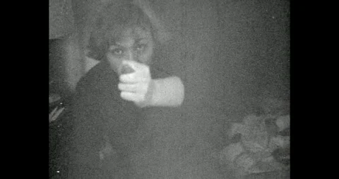 Ukraine - circa 1980s: Bored Soviet students in a dormitory, girl making a rude Stock Footage 328856482