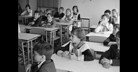 Ukraine - circa 1980s: Elementary School Students in Soviet Era Classroom Stock Footage 323389994