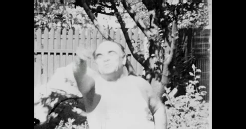 Ukraine - circa 1980s: Energetic Middle-Aged Man Performing Calisthenics and Video stock 320674559