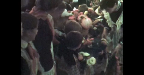 Ukraine - circa 1980s: First Grader with huge bows and bouquet of flowers Stockbeeldmateriaal 323655828