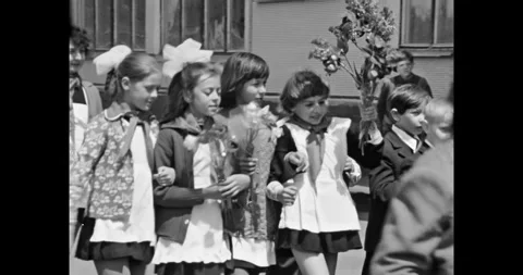 Ukraine - circa 1980s: Joyful Soviet Pupils in School Uniforms Stock Footage 323390047