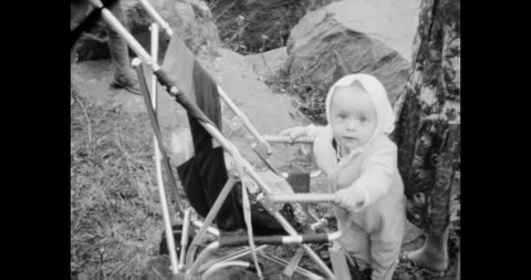 Ukraine - circa 1980s: Smiling Mother Watches Her Toddler Girl Vídeos de archivo 322193853