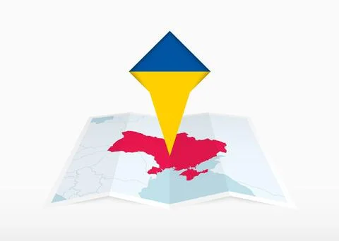 Ukraine is depicted on a folded paper map and pinned location marker with f.. Stock Illustration