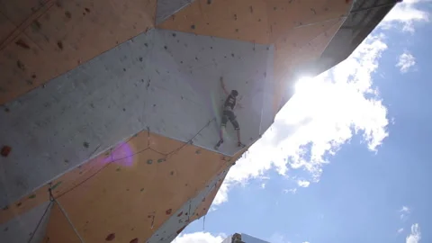 Ukraine, Dnipro. May 2017. Open climbing training on artificial rock. Stock Footage 127055320