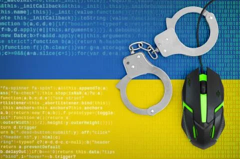 Ukraine flag  and handcuffed computer mouse. Combating computer crime, hacker Stock-Fotos