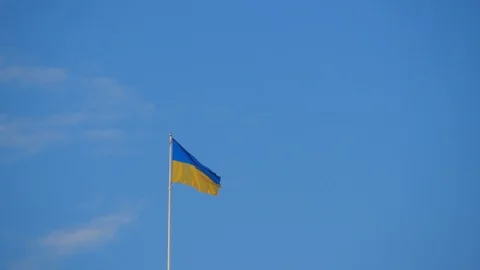 Ukraine flag on a background of blue sky. Stock Footage 122209946