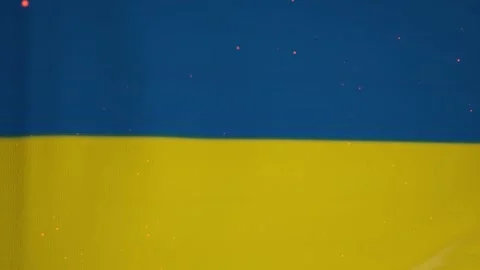 Ukraine flag loop. Realistic looping 4K. Seamless loop with fire particles. 4K Stock-Footage 242618163