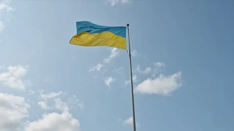 Ukraine flag wave on blue sky background.Country independence.Patriotic sign 4k Stock Footage 283296843