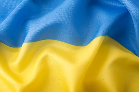 Ukraine flag waving in the wind background Fotos de archivo