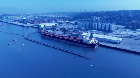 Ukraine grain loading freighter ship in Canada with drone flyover shipment Stock Footage 233260482