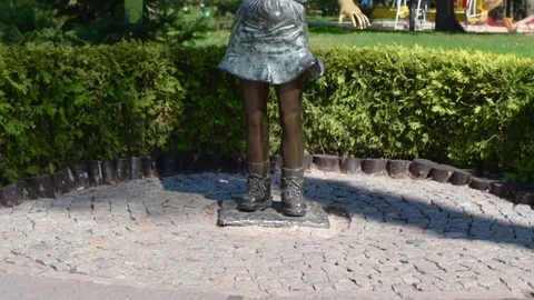 Ukraine, Kharkiv-August 20, 2017: Bronze sculpture of a girl with a bird Stock Footage