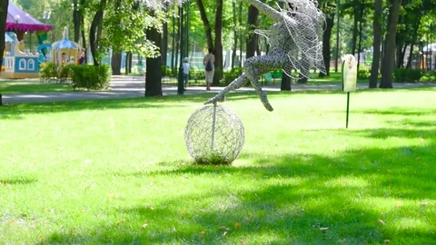 Ukraine, Kharkiv-August 20, 2017: Sculpture of a girl with a dandelion Stock Footage 79472362