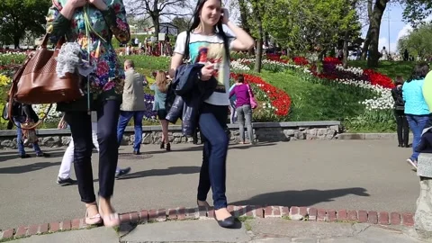 UKRAINE, KIEV, AUGUST 2, 2017: People in the park on a walk Stock Footage 86126247