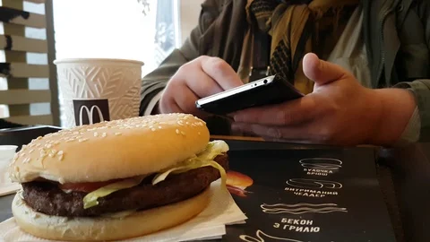 Ukraine Kiev December 7, 2017 McDonald's restaurant coffee man lunch Video stock 89233302
