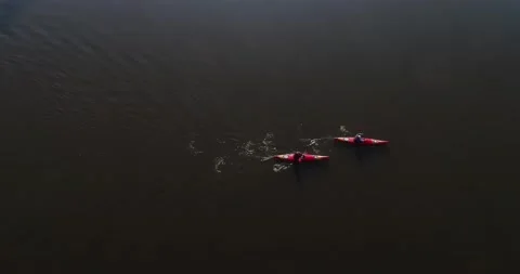 Ukraine. Kyiv. A couple on a canoe float on the river. Autumn. Stock Footage 171727542