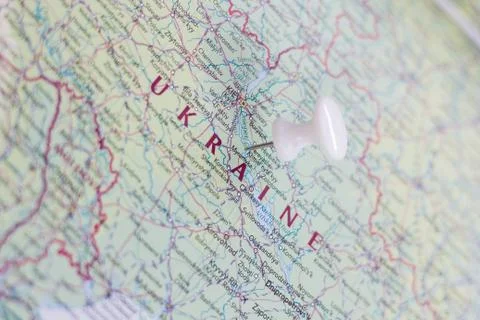 Ukraine on the map of the world. Stock Photos