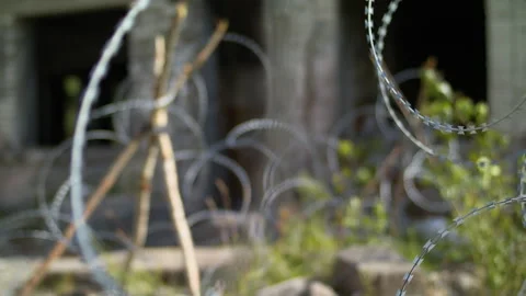 Ukraine war barbed wire. Destroyed Donetsk. Barrage against military invasion. Stock Footage 204161914
