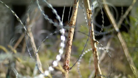 Ukraine war barbed wire. Destroyed Donbass. Video stock 204162724