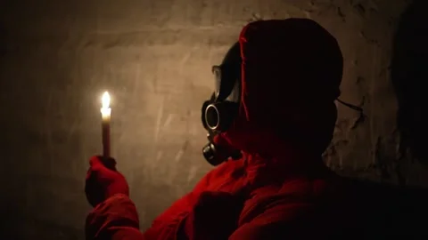 Ukraine war. Bunker, nuclear war, a man in a gas mask, hiding in a bomb shelter Stock Footage 244545917