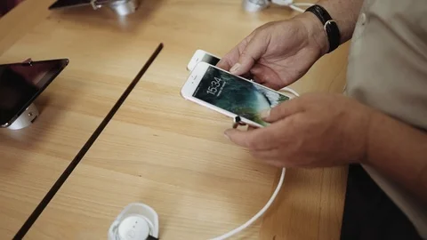 Ukraine/Chernivtsi - 7/03/2017: man using smartphone in mobile store Video stock 87971047