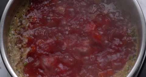 Ukrainian beet borscht bubbling in a pot. Stock Footage 296404332