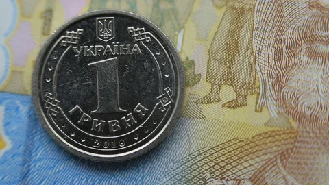 Ukrainian coins of a new sample. One hryvnia macro Stock Footage 116666072