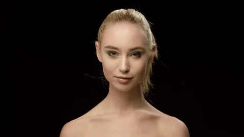Ukrainian fashion model closeup isolated on black background. Beautiful model Stock Footage 71761553