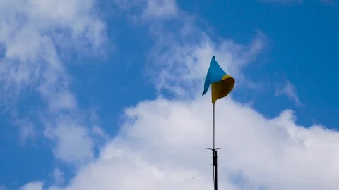 Ukrainian flag on the blue sky background Stock Footage 76450293