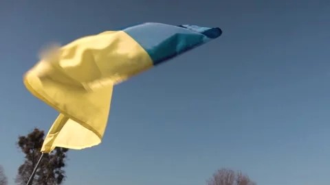 Ukrainian flag on a flagpole. blue sky background. Stock Footage 171936765