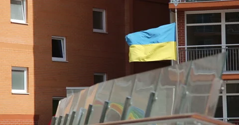 Ukrainian flag is fluttering in the wind. Video stock 53857494