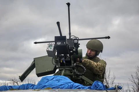 Ukrainian forces test new automatic air defense machine gun, Undisclosed, Ukrain Stock Photos