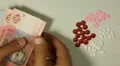 Ukrainian Hryvna UAH, Counting Drugs and Money, Health Care, Colorful Pills HD Footage