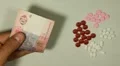 Ukrainian Hryvna UAH, Counting Drugs and Money, Health Care, Colorful Pills HD Footage