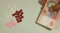 Ukrainian Hryvna UAH, Counting Drugs and Money, Health Care, Colorful Pills HD Footage