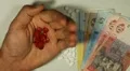 Ukrainian Hryvna UAH, Counting Drugs and Money, Health Care, Colorful Pills HD Footage