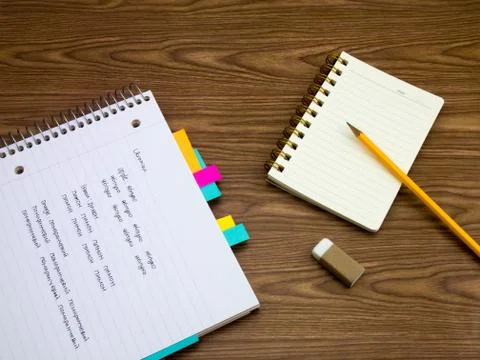 Ukrainian; Learning New Language Writing Words on the Notebook Stock Photos