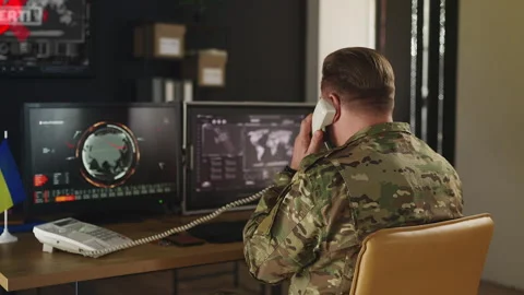 Ukrainian military responding to security breach, reporting situation by phone Stock Footage 333307366
