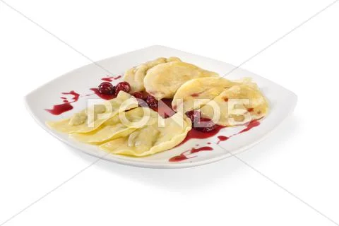 Ukrainian national dish varenyky (ravioli) with cherry Stock Photos