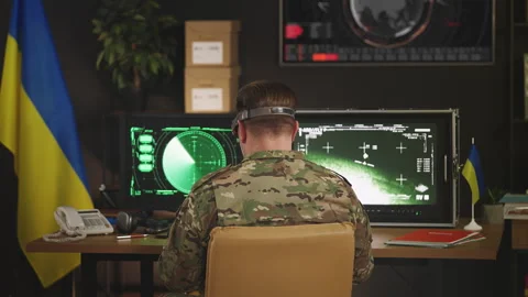 Ukrainian pilot flying FPV drone in command center, collecting intelligence Stock Footage 335539132
