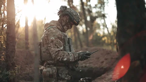 Ukrainian pilot in full gear and body armor, with an FPV strike drone Stock Footage 343507447