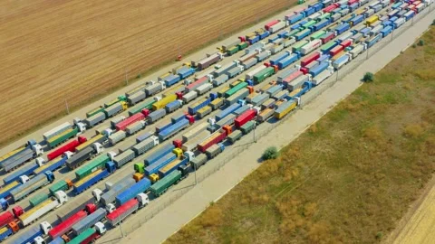 The Ukrainian port is blocked, a huge queue of trucks loaded with grain crops. Stock Footage 197082854