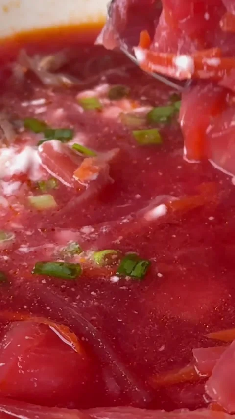 Ukrainian red soup borsch - appetizing soup with tomato paste, potato, spices Stock Footage 323506203
