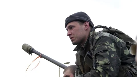 Ukrainian serviceman talks to  a pro-Russian locals 스톡 동영상 232747012