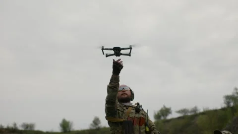 Ukrainian soldier using a drone for air intelligence Stock Footage 246414818