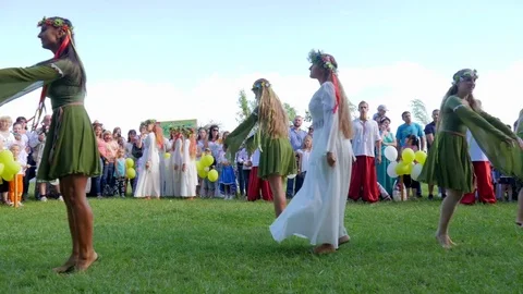 Ukrainian traditional dances and songs, girls dancing folk dance in costumes Stock Footage