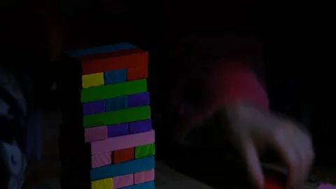 Ukrainians have fun without electricity. Blackout Ukraine. Ukrainians play board Stock Footage 232810099