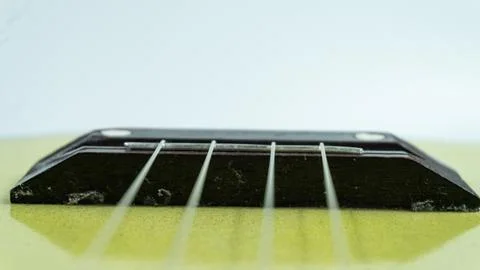 Ukulele with 4 strings on a white background Stock Photos