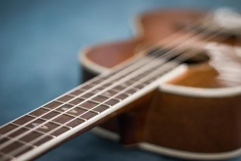 Ukulele blue background Stock Photos