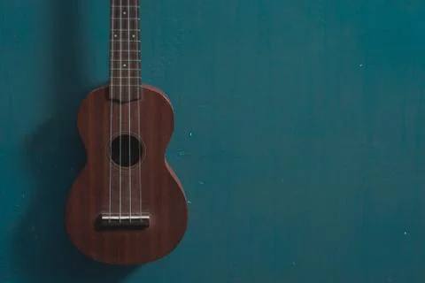 Ukulele on close up isolated blue background Stock Photos