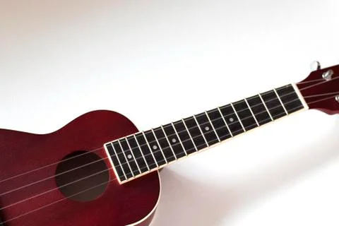 Ukulele crosses a white background Stock Photos